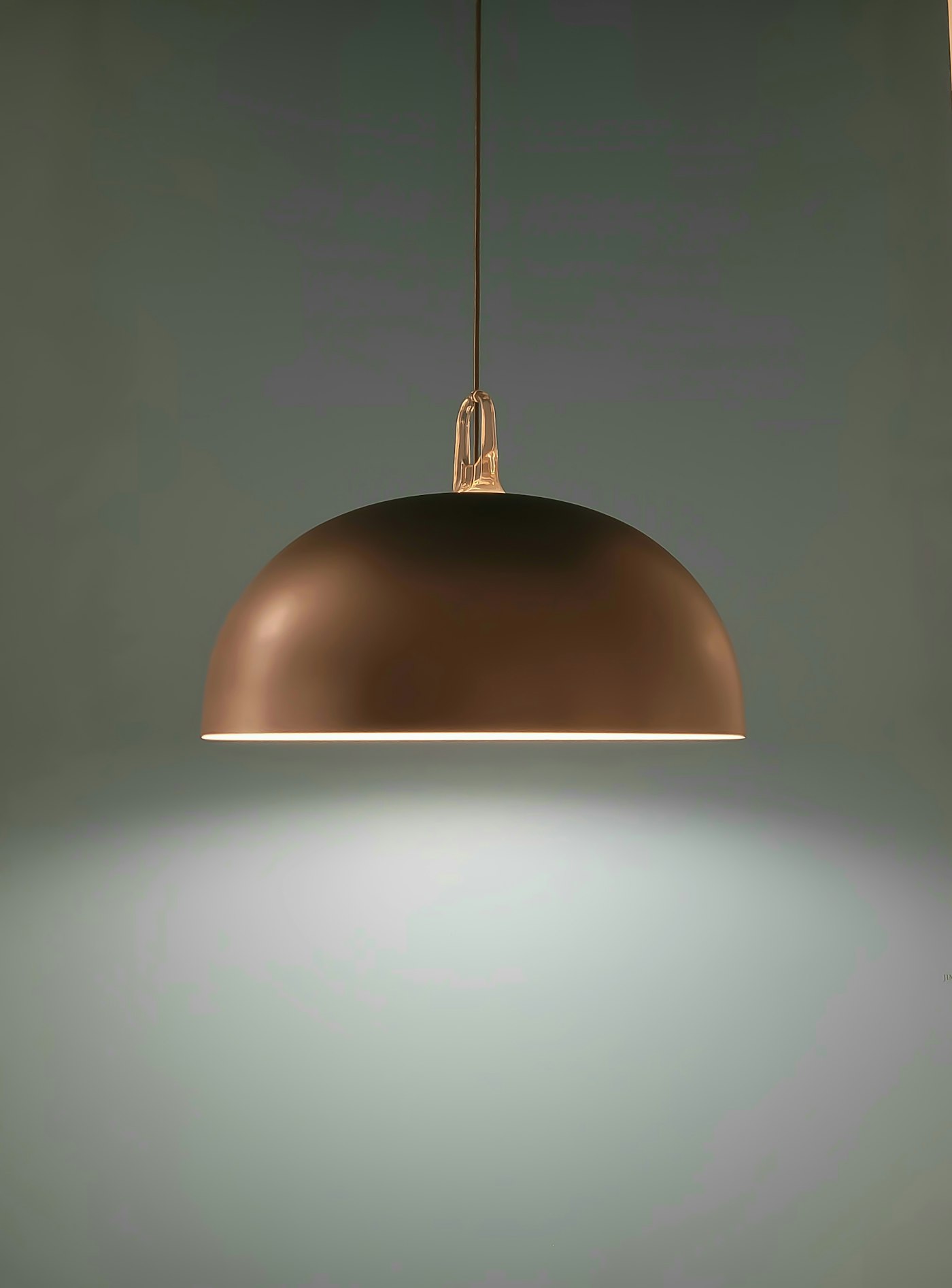 Orb Pendant hanging from a ceiling