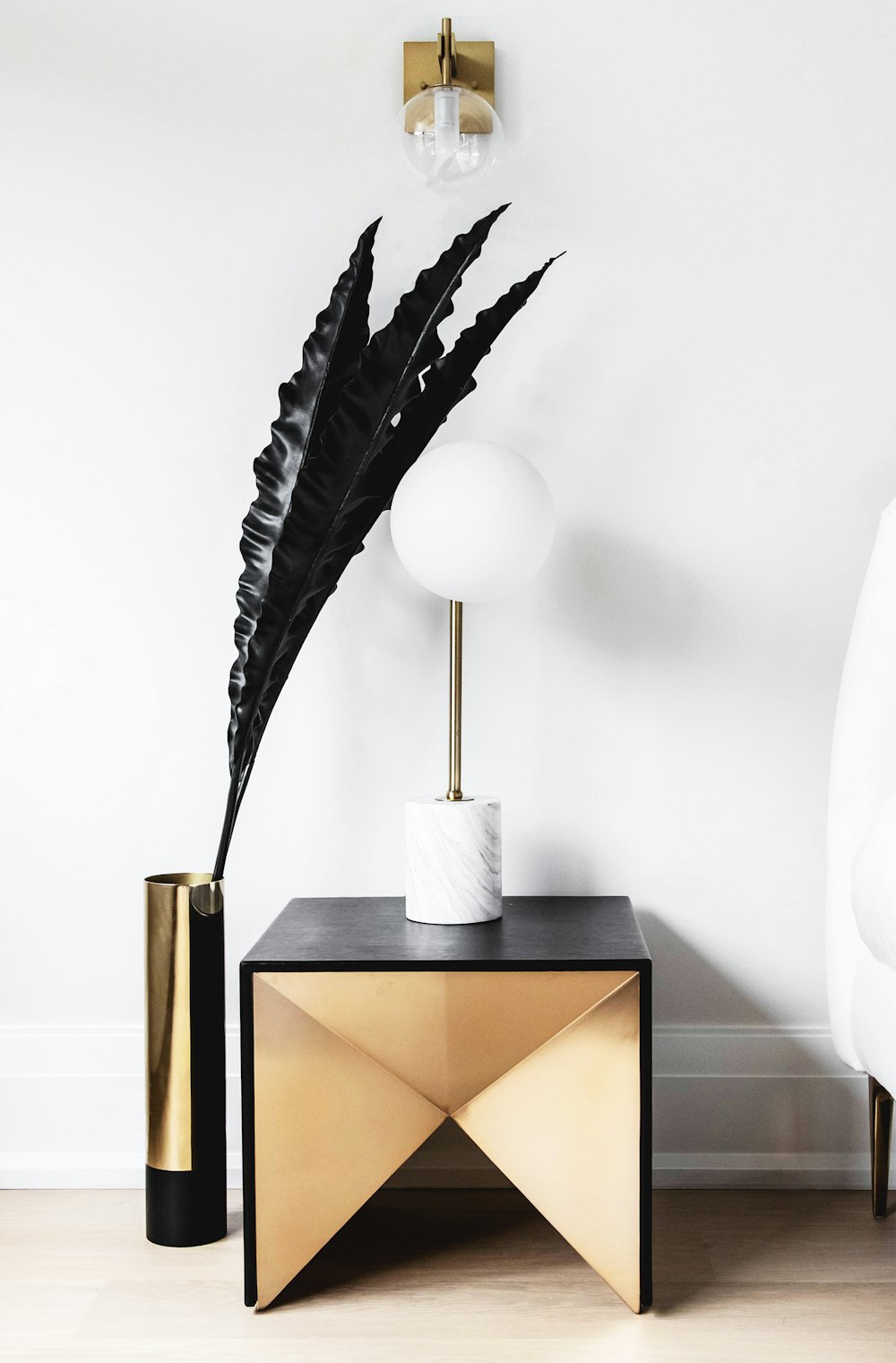 A lamp on a slender stand