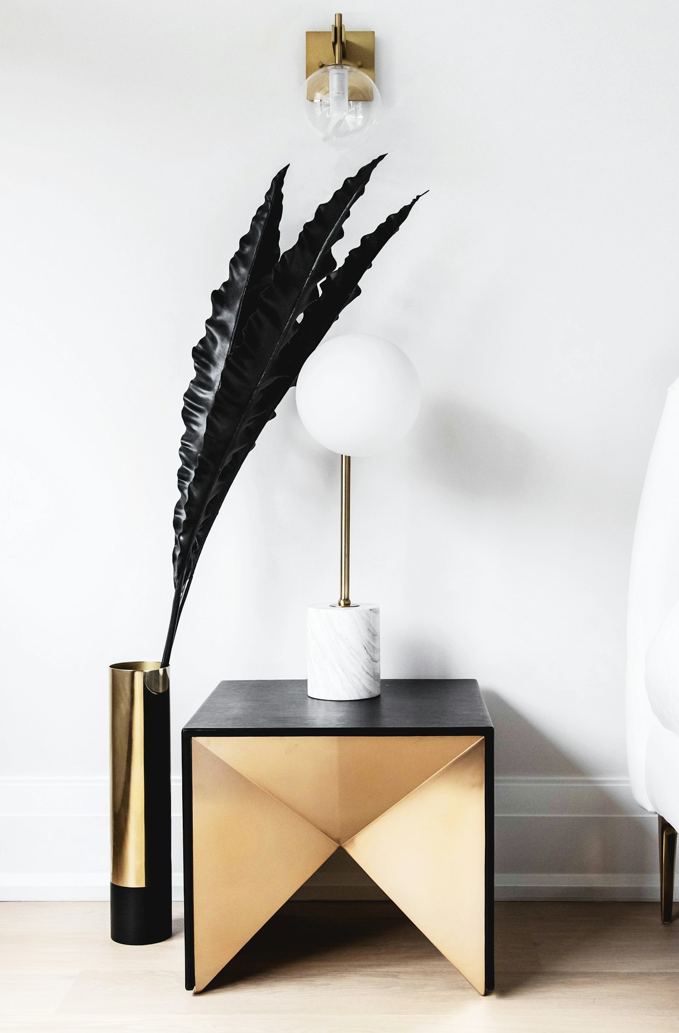 A lamp on a slender stand