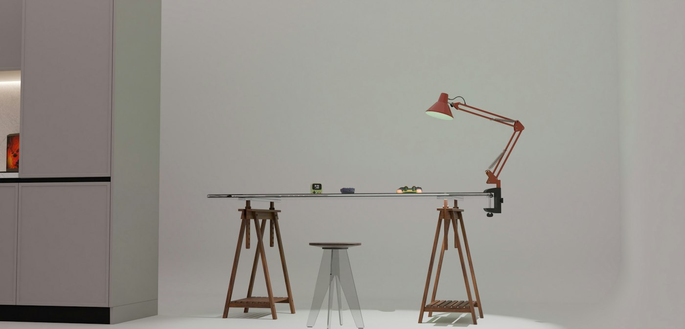Minimalist room with a long table and red lamp